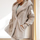 ❄️Spécial hiver Livraison gratuite❄️Veste à capuche douce et floue avec poches pour femmes