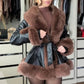 Manteau pour femmes en similicuir avec col en fausse fourrure