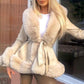 Manteau pour femmes en similicuir avec col en fausse fourrure