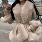 Manteau pour femmes en similicuir avec col en fausse fourrure