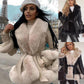 Manteau pour femmes en similicuir avec col en fausse fourrure