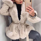 Manteau pour femmes en similicuir avec col en fausse fourrure