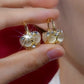 Boucles d'oreilles élégantes en or pour femmes, ornées de pierres précieuses et de cristaux