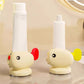 Adorable poisson rouge avec ventouse pour presser le dentifrice