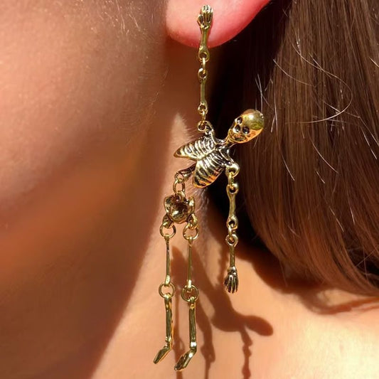 Boucles d’Oreilles Longues Pendantes en Forme de Squelette Articulé